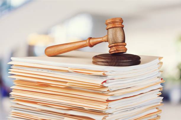 Judge hammer and documents on background বিয়ের প্রলোভনে যৌনকর্মের দণ্ডের বিধান বাতিলে রুল
